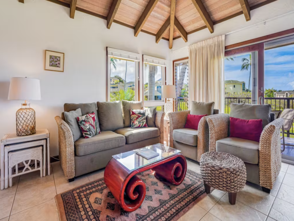 Luxury Poipu Kauai Vacation Rental  Ocean View Top-Floor Condo Near Brennecke’s Beach